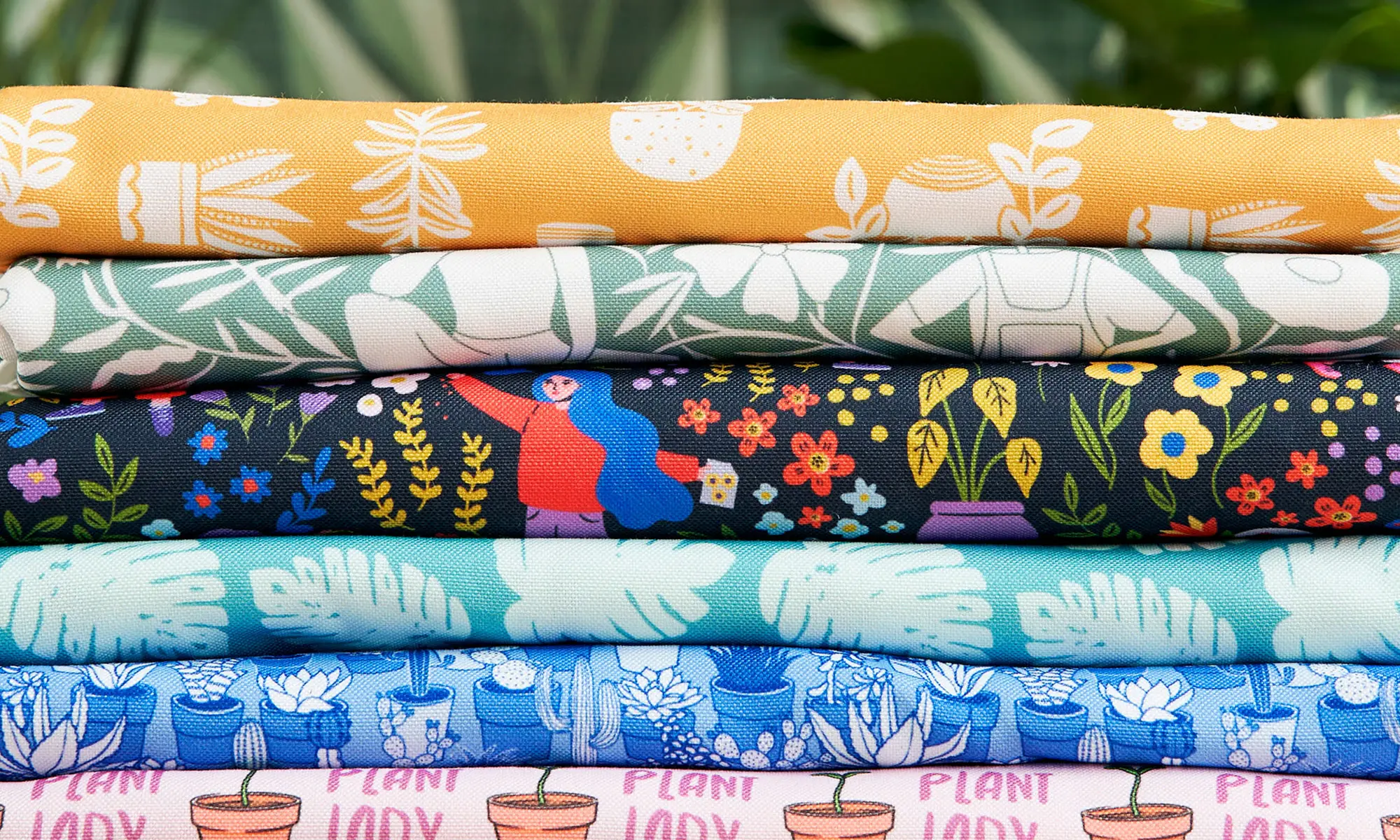 Stack of plant inspired fabrics.